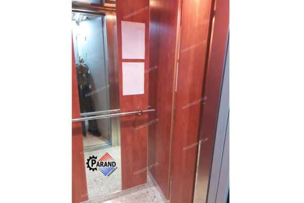 کابین آسانسور ام دی اف استیل قرمز چوبی طرح توسکا